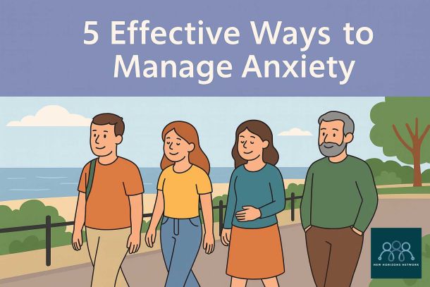 Adults walking calmly along a seaside path in Highcliffe and Christchurch, relaxed and smiling, symbolising wellbeing and anxiety management.