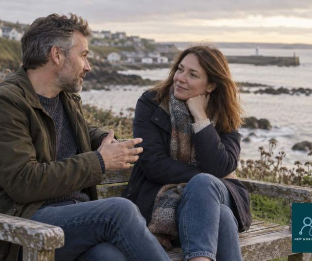 Two adults having a supportive conversation representing connection on World Suicide Prevention Day.
